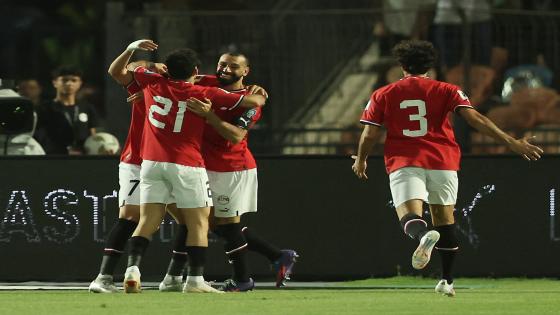 Soccer Football - World Cup - African qualifiers - Egypt v Burkina Faso - Cairo International Stadium, Cairo, Egypt - June 6, 2024 Egypt's Trezeguet celebrates scoring their first goal with Mohamed Salah REUTERS/Amr Abdallah Dalsh